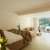 Отель The Ixian All Suites, фото 3