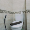 Отель Homey And Comfy Stay Studio Apartment At B Residence, фото 13