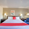 Отель OYO Woodland Hotel and Suites, фото 7