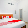 Отель OYO Living 2217 Permana Guesthouse Syariah, фото 3