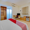 Отель Capital O 3905 Graha 100 Guest House Syariah, фото 6