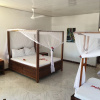 Отель Nungwi Inn Beach Cottages, фото 3