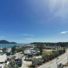 Отель Rustic one bedroom unit for 4 pax with Sea View by JoMy Homestay, фото 1