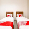 Отель Falah Residence Syariah by OYO Rooms, фото 36