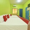 Отель OYO 90566 Homestay Tg Gemok, фото 8