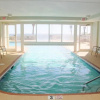 Отель Tradewinds unit 1304 - Top Floor Beach Front w/Panoramic Views - 2bed/2 bath, фото 3