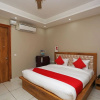 Отель OYO 24626 Palm Garden Suites, фото 7