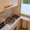Отель Holiday apartment with large garden and lake view, swimming pool at 200m., фото 32