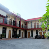 Отель OYO 1126 Trio R Kost Syariah, фото 1