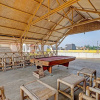 Отель OYO 91522 Candi Gebang Guesthouse, фото 11