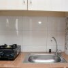 Отель Comfy And Tidy Studio Apartment At Margonda Residence 4 Near Ui, фото 5