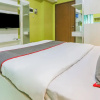 Отель Super OYO Capital O 93910 Asia Rooms @ Green Lake View Ciputat, фото 36