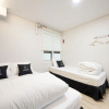 Отель K-Guesthouse Premium Busan 1, фото 4