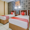 Отель OYO 3936 Hotel Trisula Makassar, фото 2