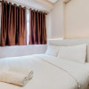 Отель Modern Look And Comfortable 2Br Serpong Greenview Apartment, фото 8