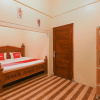 Отель OYO 3715 Ndalem Jogja Cupuwatu Syariah, фото 18