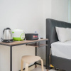 Отель Cozy and Comfy Studio Tree Park Apartment, фото 8