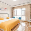 Отель Mango Business Holiday Apartment (Dalian South China Plaza), фото 3