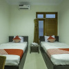 Отель OYO 2259 Zleepy Ks Tubun, фото 15