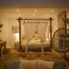 Отель PARENTHESE LOVE : Bali Mon Amour - Suite Jacuzzi SPA - Proche Orly / Paris в Ла-Виль-дю-Буа