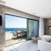 Отель Seafront elegant villa, with infinity pool & devine views!, фото 3