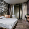 Отель Upscale Suites, фото 4