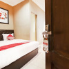 Отель OYO 519 Coin Mulia Hotel, фото 7