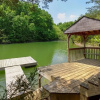 Отель Lakeside Dreams Rustic Lakefront Cabin w Hot Tub Dock and Game Room, фото 10