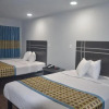 Отель Travelers Inn & Suites, фото 14