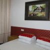 Отель Zhiyuan Homestay Ancient City North Gate, фото 3
