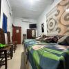 Отель OYO 94004 Kenari Residence, фото 2