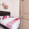 Отель OYO 885 Tangkul Residence, фото 3