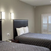 Отель Mid City Inn And Suites, фото 3