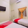 Отель OYO 3715 Ndalem Jogja Cupuwatu Syariah, фото 7