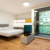 Отель New High Tech Apartment Complex Modern, Simple and Stylish в Орильо