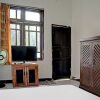 Отель SPOT ON 92856 Home Stay Syariah Aom Kusman, фото 17