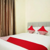 Отель OYO 654 Fabio Guest House Syariah, фото 3