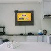 Отель Cozy Stay Studio At Transpark Bintaro Apartment, фото 1
