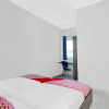 Отель OYO 91065 Guest House 19 Syariah, фото 19