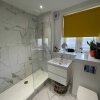 Отель Contemporary 1BD Flat W/balcony - Stoke Newington!, фото 9