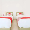 Отель OYO 2896 Uma Menuh Guest House Near Pantai Keramas, фото 6