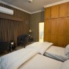 Отель Secure Inn Guest House Bahria Town, фото 6