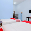 Отель OYO 2450 Hening Homestay Near Pantai Tanjung Bias, фото 10