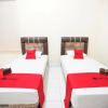 Отель Reddoorz Plus Syariah Near Pasar Sekumpul Martapura, фото 11