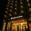 Отель Checkinn Hotel, фото 1