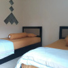 Отель OYO 91162 Homestay Ansyariah Syariah, фото 4