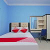 Отель OYO 90752 Ridho Guest House Syariah, фото 6