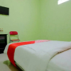 Отель OYO Life 2508 Alba Suites Homestay Syariah, фото 24