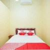 Отель OYO 1624 Panjang Jiwo Residence, фото 7