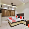 Отель OYO 16122 Hotel Navya Palace, фото 6